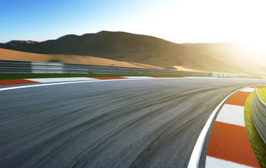 Motion blurred race track .