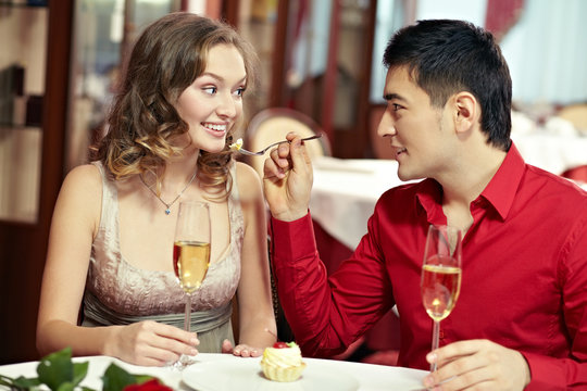 Young couple dining out at restaurant