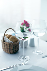 Two wine glasses on table restaurant table