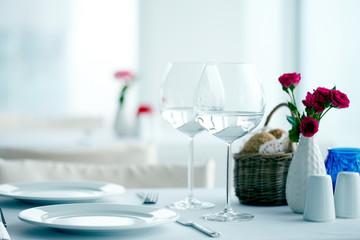 Table at restaurant for two with wineglasses