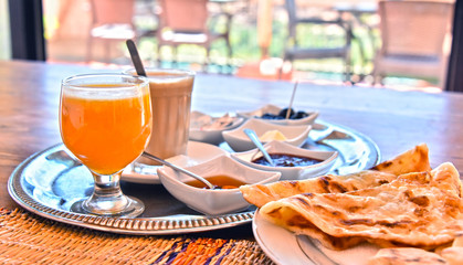 Moroccan breakfast served on hotel terace in Atlas Mountains