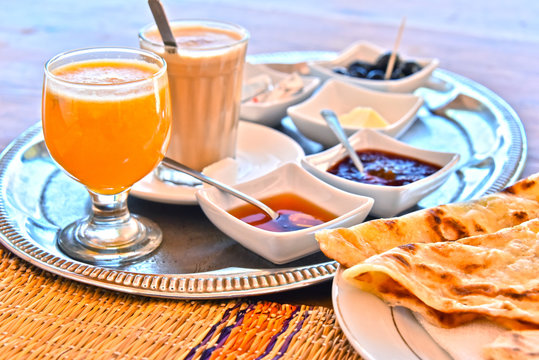 Moroccan breakfast served on hotel terace in Atlas Mountains