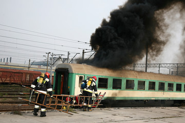 firemen in action, Firefighters exercises train accident, chemical contamination
