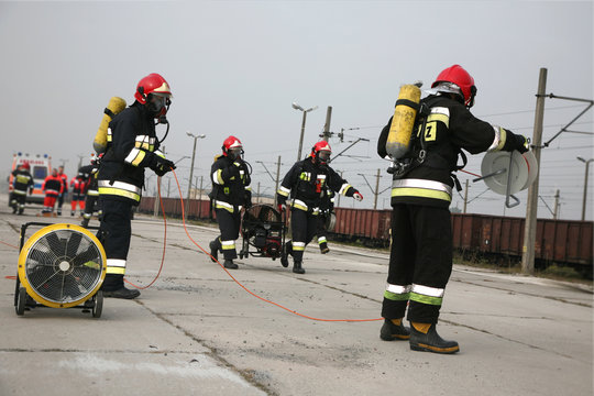firemen in action, Firefighters exercises train accident, chemical contamination
