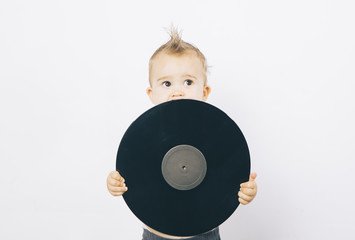 Little girl with a vinyl record