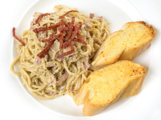 Spaghetti Cabonara and garlic bread.
