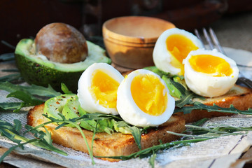 Toast with eggs and avocado