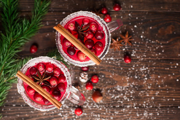 Festive Cranberry drink on Christmas background, holiday time, top view, winter concept