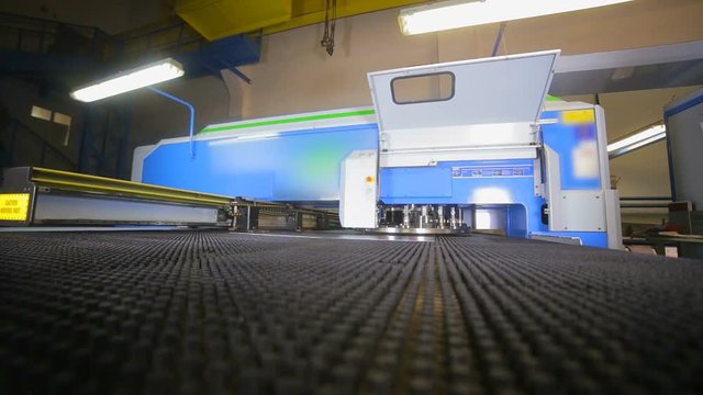Punching machine. Robotic automated cnc machine working. HD