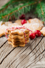 Christmas Gingerbread Cookies Star Shape in Stack. Holiday concept decorated with Fir Tree