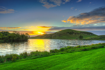 Idyllic sunset scenery at Lough Gur lake in Ireland