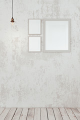 Blank photo frames on the wall