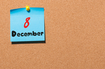 December 8th. Day 8 of month, Calendar on cork notice board. Winter time. Empty space for text