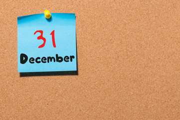 December 31st. Day 31 of month, Calendar on cork notice board. New year at work concept. Winter time. Empty space for text