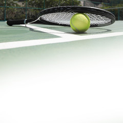 Tennis racket and ball