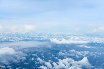 blue sky and ocean view above the Clouds from airplane