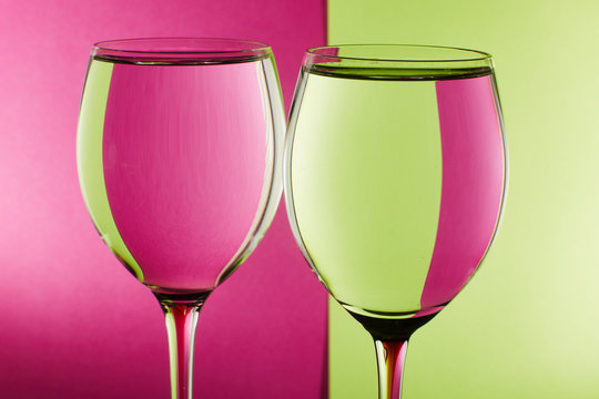 two glasses on colorfull back
