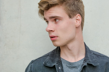 Teen boy model looking side modern feel portrait closeup