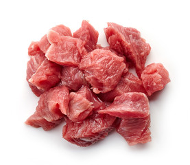 Heap of raw diced beef meat isolated on white, from above