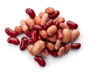 Heap of various canned beans isolated on white, from above