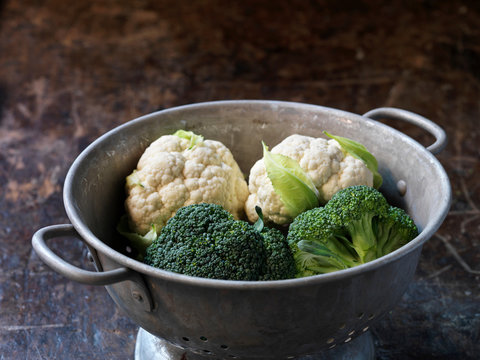 Fresh organic vegetables, baby cauliflower and broccoli