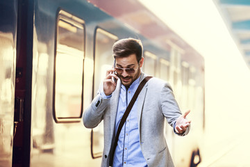 Businessman on railroad station