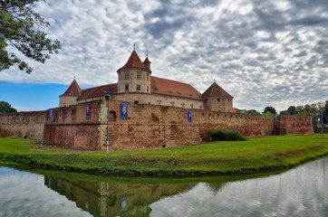 Naklejka na ściany i meble Fagaras fortress with reflection