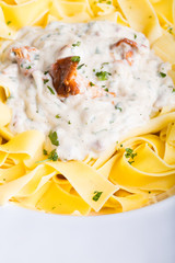 Pasta with cream sauce with chanterelle