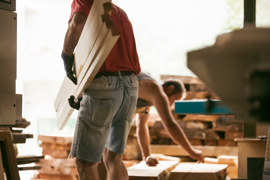 Carpenter working in workshop