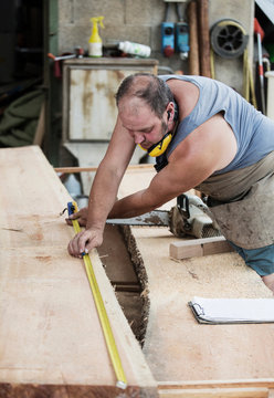 Carpenter working in workshop