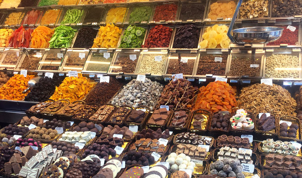 Candied fruits, nuts and chocolate on the market of Barcelona