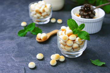 Thai sweetmeat made of flour, egg and sugar or kanom ping in Thai.