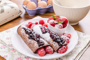 Cocoa pancakes with berries