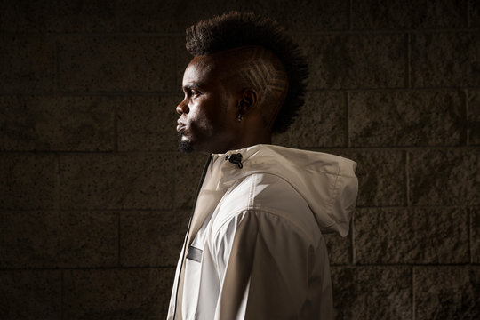 Profile of young man with mohawk