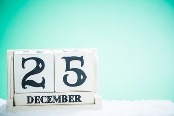 Wooden calendar with Christmas eve date