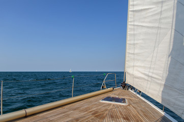 Fototapeta na wymiar Yachting on the ocean, front deck