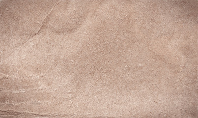 Creased paper texture. Brown background with space for text