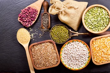 Plexiglas foto achterwand various cereals, seeds, beans and grains © Nitr