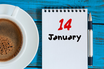 January 14th. Day 14 of month, calendar on Engineer workplace background. Winter time. Empty space...