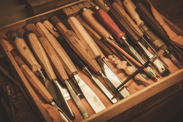 Close-up of the carpenter tools in restorer workshop