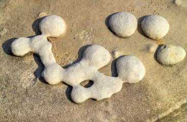 Beautiful figures on stone surface closeup