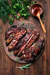 Gordijnen Grilled sliced barbecue pork ribs © voltan