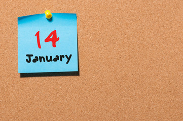 January 14th. Day 14 of month, Calendar on cork notice board. Winter time. Empty space for text