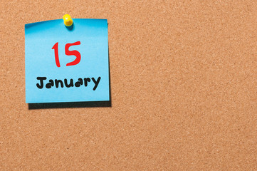 January 15th. Day 15 of month, Calendar on cork notice board. Winter time. Empty space for text