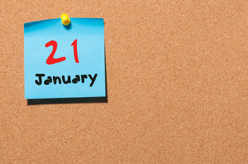 January 21st. Day 21 of month, Calendar on cork notice board. Winter time. Empty space for text