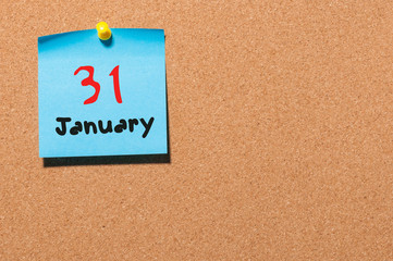 January 31st. Day 31 of month, Calendar on cork notice board. New year at work concept. Winter time. Empty space for text
