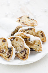 Christmas Stollen on a plate, vertical, closeup