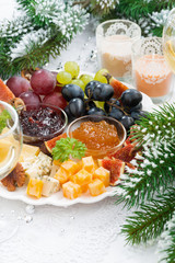 delicacy cheese and fruit plate, vertical
