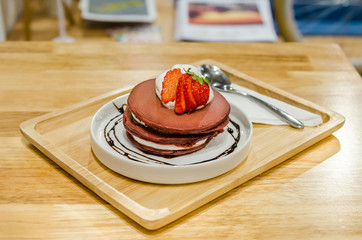 Strawberry shortcake with whipped cream, selective focus