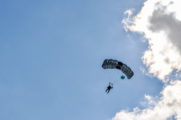 Parachutist and sky